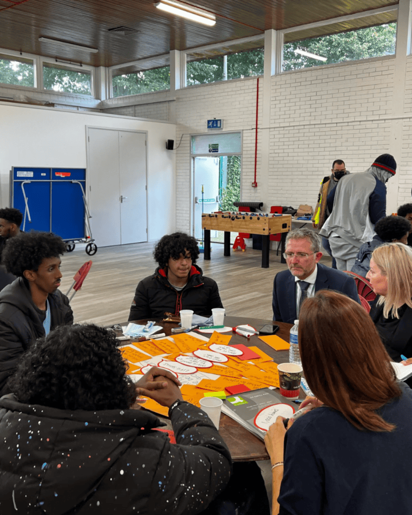 Diverse group participating in a workshop at Participation People.