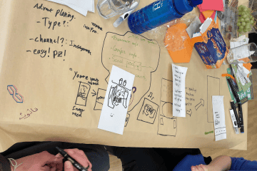 Youth engaging in community rail projects for sustainable travel.