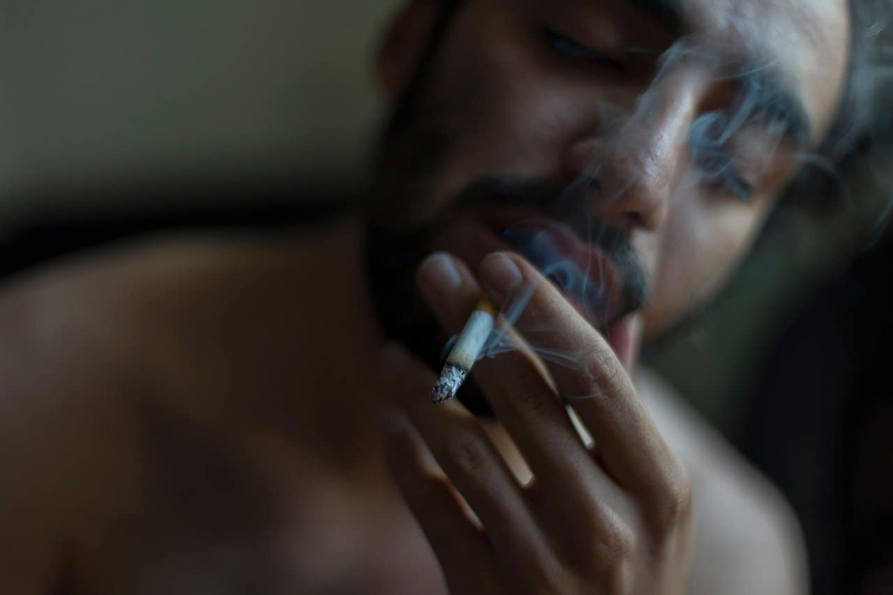 Empowered Youths Smoking Cigarette