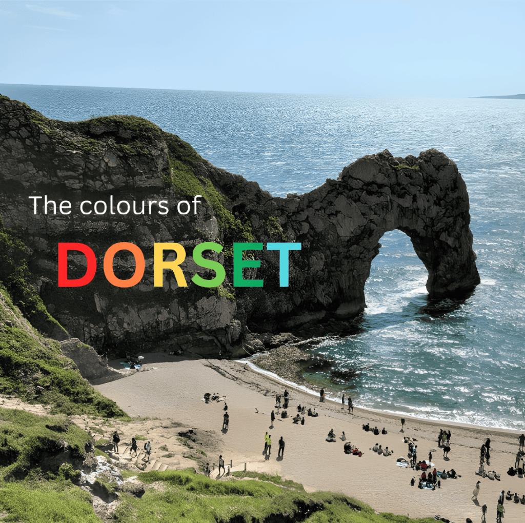 a photo of durdle door, a geological feature by a beach and the ocean, with 'the colours of dorset' overlaid. each letter of dorset is a different colour. created by one of our dorset young content creators