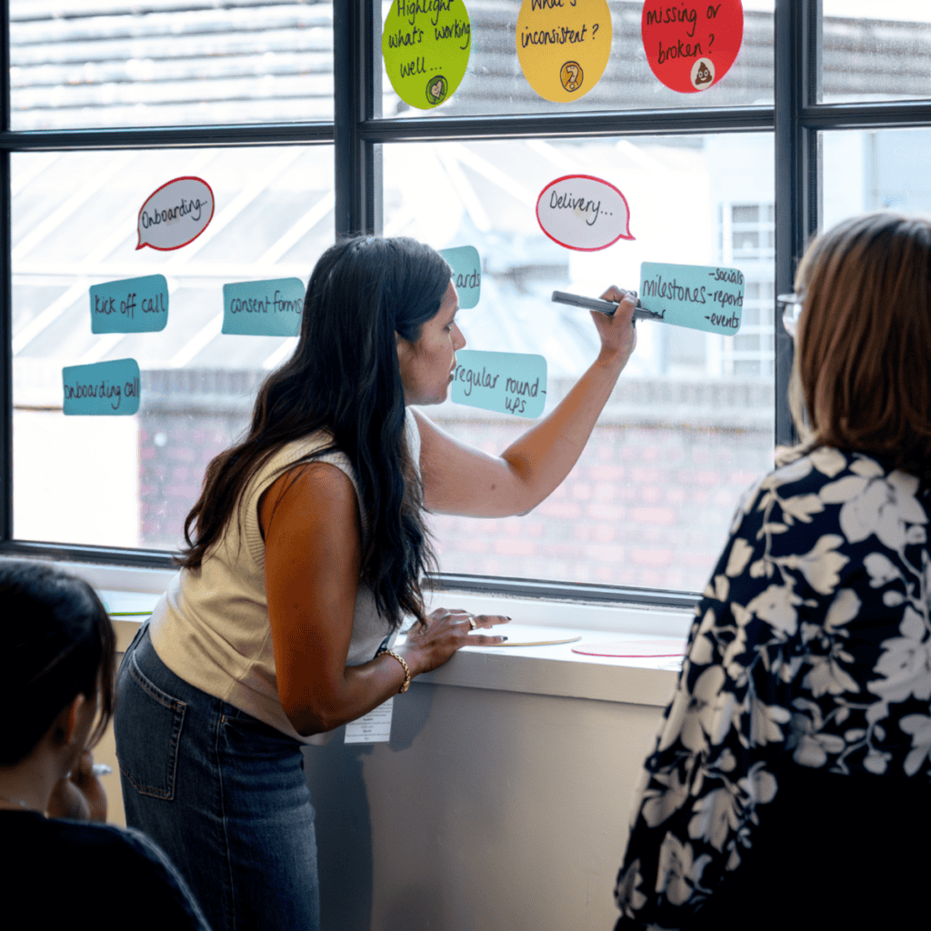 Team collaboration and brainstorming session in a modern office environment.